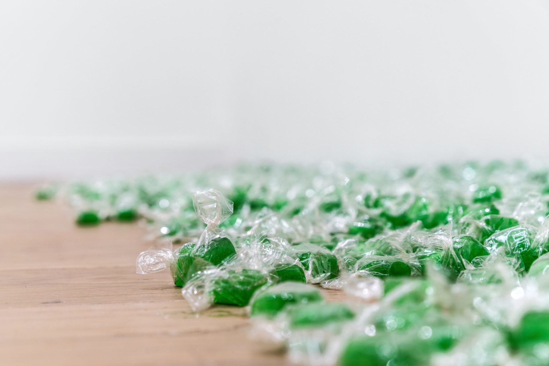 detail photo of wrapped green candies