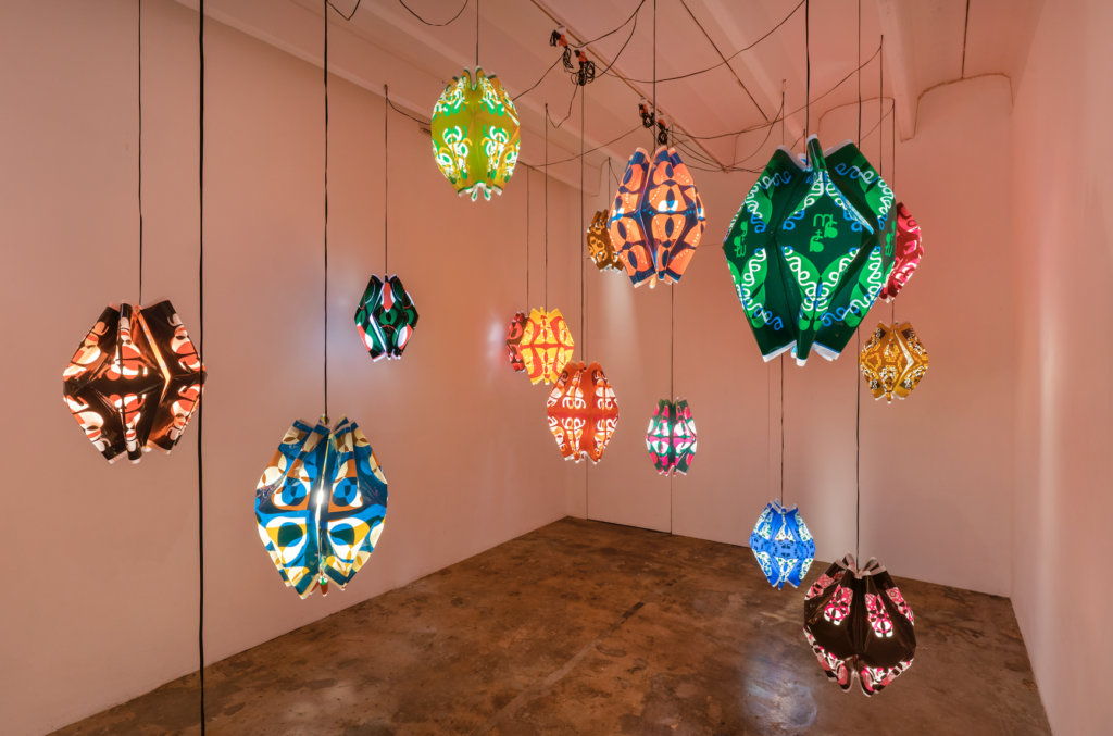 representative image of hialeah electric - metavector exhibition, colorful geometric lamps
