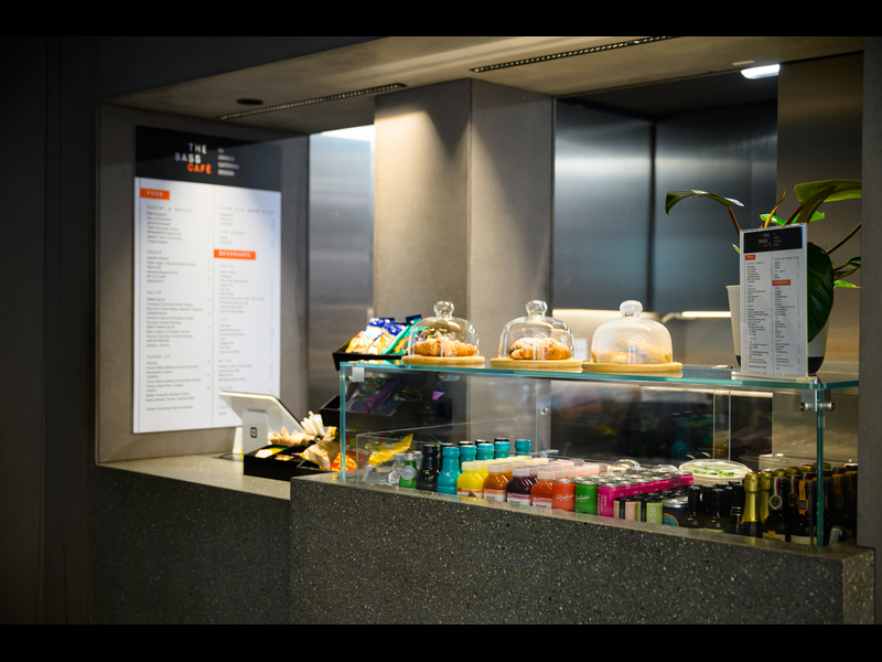 Counter view of The Cafe at The Bass by Unique Catering with the Cafe menu in the background